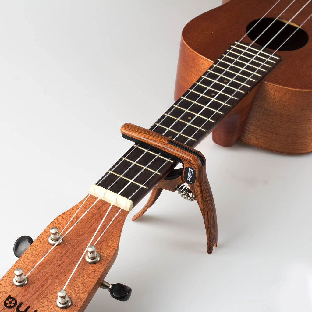 MEELAND 3in1 Guitar Capo for Acoustic and Electric Guitars Ukulele,(Picks Holder and Bridge Pins Puller and capo 3 in 1）Free 3 Picks Rosewood colour